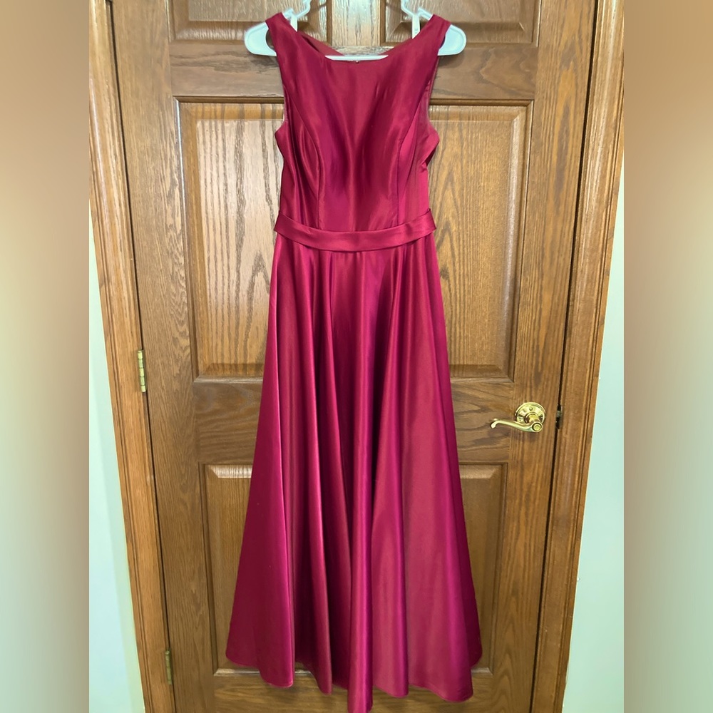 Custom size dress, in burgundy. This dress will fit a small to medium.